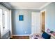 Bedroom featuring hardwood floors and an open closet at 48 Blue Heron Ln, Roxboro, NC 27574