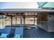 Covered dock with seating, providing a relaxing waterfront retreat at 48 Blue Heron Ln, Roxboro, NC 27574