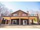 Multi-level lake house with spacious decks and outdoor seating at 48 Blue Heron Ln, Roxboro, NC 27574
