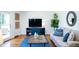 Bright living room with hardwood floors, and coastal decor creating a serene and inviting atmosphere at 48 Blue Heron Ln, Roxboro, NC 27574