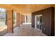 Open patio with brick columns offering beautiful views of the lake at 48 Blue Heron Ln, Roxboro, NC 27574