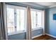 Bright room with large windows providing natural light and outdoor views at 48 Blue Heron Ln, Roxboro, NC 27574
