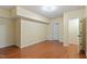 Expansive bedroom featuring wood floors, neutral walls, and recessed lighting at 5036 Isabella Cannon Dr, Raleigh, NC 27612