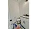 Powder room featuring granite counters, white cabinets, and modern lighting at 60 Moonraker Dr, Spring Hope, NC 27882