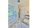 Bathroom showcasing double vanity, large tub and a glassed-in shower at 60 Moonraker Dr, Spring Hope, NC 27882