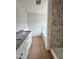 Bathroom featuring a marble countertop with double sinks, a bathtub, and a tiled shower at 60 Moonraker Dr, Spring Hope, NC 27882