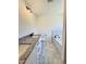 Bathroom boasts double vanity, modern fixtures, and a tub with a tile surround at 60 Moonraker Dr, Spring Hope, NC 27882