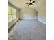 Vaulted ceiling bedroom with ceiling fan and natural light from a large window at 60 Moonraker Dr, Spring Hope, NC 27882