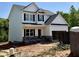 Charming new construction two-story home with stone accents and attached two car garage at 60 Moonraker Dr, Spring Hope, NC 27882
