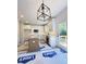 Bright kitchen with white cabinets, granite countertops, and stainless steel appliances at 60 Moonraker Dr, Spring Hope, NC 27882