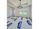 Living room with hardwood flooring, neutral paint, and recessed lighting at 60 Moonraker Dr, Spring Hope, NC 27882