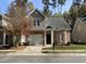 Charming two-story home features a brick facade, attached garage, and well-maintained landscaping at 6002 River Estates Dr, Knightdale, NC 27545
