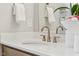 Bathroom featuring a double sink vanity, quartz countertops, modern fixtures, and a mirror at 607 Callan View Ave, Wake Forest, NC 27587