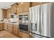 Kitchen featuring stainless steel appliances, gas cooktop, oven, microwave, and ample cabinet space at 607 Callan View Ave, Wake Forest, NC 27587