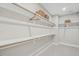 Spacious walk-in closet with ample shelving and storage space for optimal organization at 607 Callan View Ave, Wake Forest, NC 27587