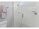 Modern bathroom features a glass-enclosed shower with sleek white tiles at 6116 Wilkinsburg Rd, Raleigh, NC 27612