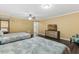 Bedroom featuring two beds, a TV, and a ceiling fan at 6160 Virgilina Rd, Roxboro, NC 27574