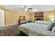 Bedroom featuring two beds, a TV, and a brick fireplace at 6160 Virgilina Rd, Roxboro, NC 27574