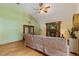 Comfortable living room with hardwood floors, stone fireplace, and access to the backyard at 6160 Virgilina Rd, Roxboro, NC 27574