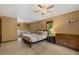 Relaxing main bedroom with large bed, ceiling fan, and cozy furniture at 6160 Virgilina Rd, Roxboro, NC 27574