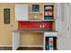 Built-in desk and shelving create a functional and stylish office area with storage at 6160 Virgilina Rd, Roxboro, NC 27574