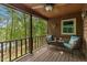Relaxing porch with comfortable seating, scenic views of the surrounding landscape at 6160 Virgilina Rd, Roxboro, NC 27574