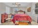 Spacious bedroom with a large bed, complemented by wooden furnishings and neutral decor at 715 Shay Dr, Durham, NC 27704