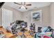 Functional bedroom space with a desk, chair, and cozy seating area, ideal for work or relaxation at 715 Shay Dr, Durham, NC 27704