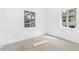 Bedroom featuring bright natural light, white walls, and empty floors at 740 Long Ave, Rocky Mount, NC 27801
