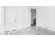 A glimpse of an unfinished bedroom with white walls and doors at 740 Long Ave, Rocky Mount, NC 27801