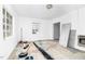 Bright living room with white walls and a large window for natural light at 740 Long Ave, Rocky Mount, NC 27801