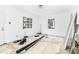 Bright living room with white walls and a large window for natural light at 740 Long Ave, Rocky Mount, NC 27801