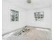 White walled room featuring light and airy atmosphere and dual glass block windows at 740 Long Ave, Rocky Mount, NC 27801