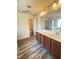 Bathroom featuring a dual vanity, shower, and tub at 78 Florence Dr, Clayton, NC 27527