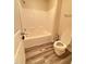 Bathroom with gray flooring, toilet and tub/shower combo at 78 Florence Dr, Clayton, NC 27527