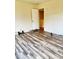This bedroom features gray flooring and an open closet at 78 Florence Dr, Clayton, NC 27527