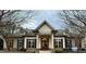 A view of the exterior of the Tuscany community clubhouse at 78 Florence Dr, Clayton, NC 27527