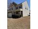 Two-story home with neutral siding, red shutters, well-maintained landscaping and an attached two-car garage at 78 Florence Dr, Clayton, NC 27527