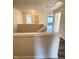 Upstairs hallway featuring white railings and doors at 78 Florence Dr, Clayton, NC 27527