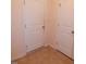 A mudroom featuring practical tile flooring and white doors at 78 Florence Dr, Clayton, NC 27527
