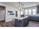 Charming kitchen featuring a spacious island, stylish pendant lighting, and modern finishes at 802 Hillfarm Dr, Wake Forest, NC 27587