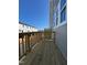 Spacious outdoor patio area with wood railings, perfect for entertaining or relaxing outdoors at 802 Hillfarm Dr, Wake Forest, NC 27587