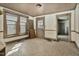 Empty dining room has natural light and traditional trim for a stylish renovation at 922 Nashville Rd, Rocky Mount, NC 27803
