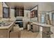 The kitchen with vintage cabinets and lots of space is ready for renovation at 922 Nashville Rd, Rocky Mount, NC 27803