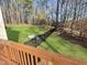 Large backyard features a metal fence and open green space at 10004 Liana Ln, Raleigh, NC 27613