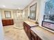 Bright bathroom with double sink vanity, granite countertops, and large frameless glass shower at 10004 Liana Ln, Raleigh, NC 27613