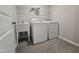Laundry room with tiled floor, utility sink and washer dryer at 10018 Secluded Garden Drive Rd # 187, Apex, NC 27523