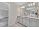 Modern bathroom with double vanity, ample counter space, and decorative accents at 102 Switchback St, Knightdale, NC 27545