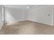 Spacious bedroom with plush carpet, decorative molding, and ample natural light at 102 Switchback St, Knightdale, NC 27545