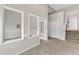 Bonus room with neutral carpet and wall color; versatile space for multiple uses at 102 Switchback St, Knightdale, NC 27545